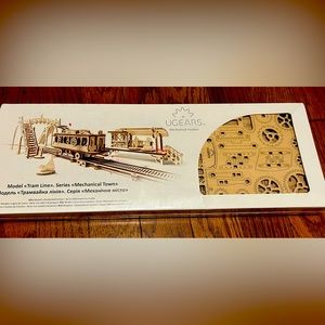 New in plastic wrap. The UGEARS Tram on rails..